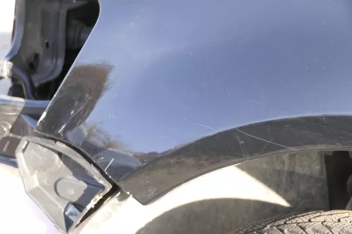 VW Fox Kotflügel vorne links schwarz L041 (151738)