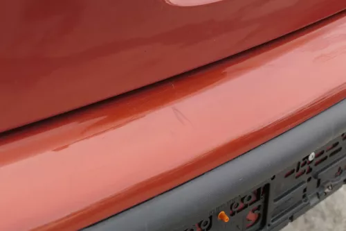 VW Polo 9N 9N3 Stoßstange Heckstoßstange hinten orange LA2W PDC (154007)