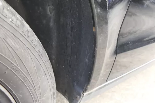 VW Polo 9N Kotflügel vorne links schwarz L041 bis ca.Bj.2004 - Rost (155946)