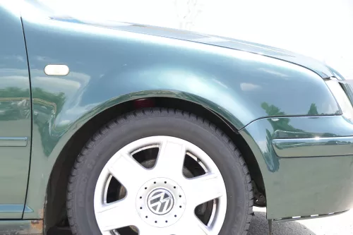 VW Bora Kotflügel vorne rechts original grün LC6M 1J5821022