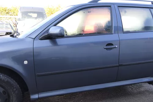 Skoda Octavia 1U Kombi + Limo Tür vorne links Fahrertür grau LF7V 9901 U9 ohne A