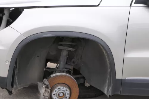 VW Tiguan Kotflügel vorne links original 5N0821105A + Leiste gelb beige LH1W (165929)