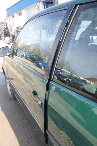 VW Lupo Seat Arosa Tür vorne links Fahrertür grün LA6N (mechanischer FH) (166669)