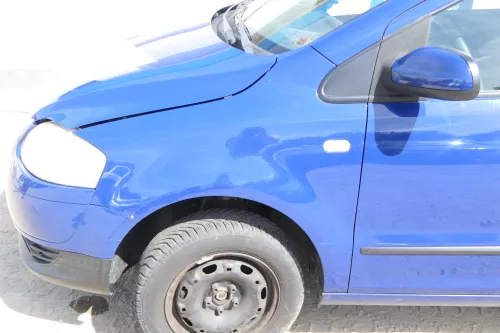 VW Fox Kotflügel vorne links blau LL5M