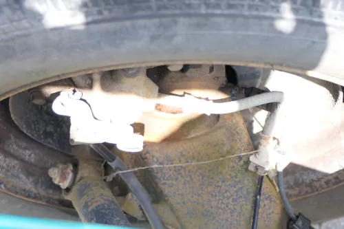 VW T5 Touareg Bremssattel hinten links 7H0615423A 1,9TDI 2.5 TDI