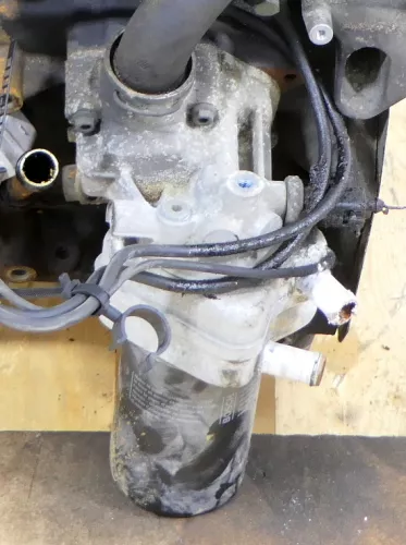 VW Audi Passat 3BG Ölkühler Halter Ölfilterflansch 06A115405BS BAWT AWM AZM