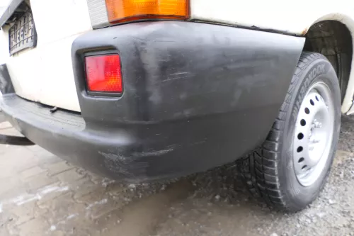 VW T4 Caravelle Multivan Stoßstange Heckstoßstange hinten 701807417 schwarz (177136)