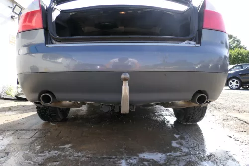 Audi A4 8E B6 Limousine Stoßstange hinten mit Spoiler grau LX7Z