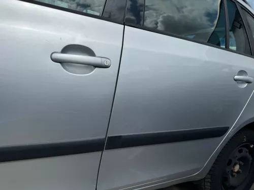 Skoda Fabia 5J Kombi Tür hinten links - silber LA7W - ohne Anbauteile (180757)