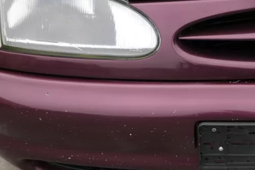 VW Sharan 7M Stoßstange Frontstoßstange vorne Nebelscheinwerfer Fleurie-Rot 93 (184821)